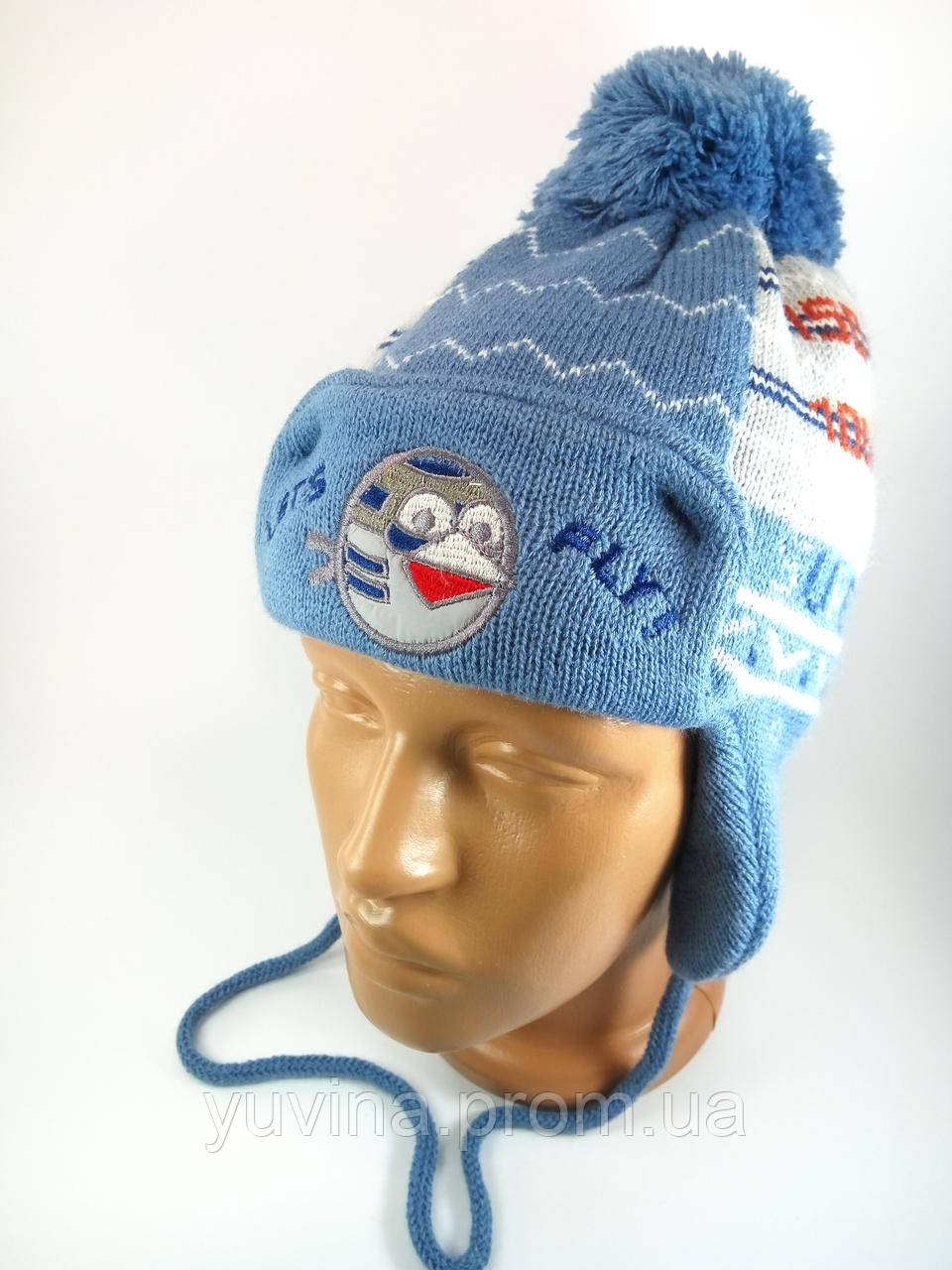 Шапка в'язана для хлопчика з зав'язками бубоном Дитячі зимові шапки Фліс Блакитна розмір 48-50