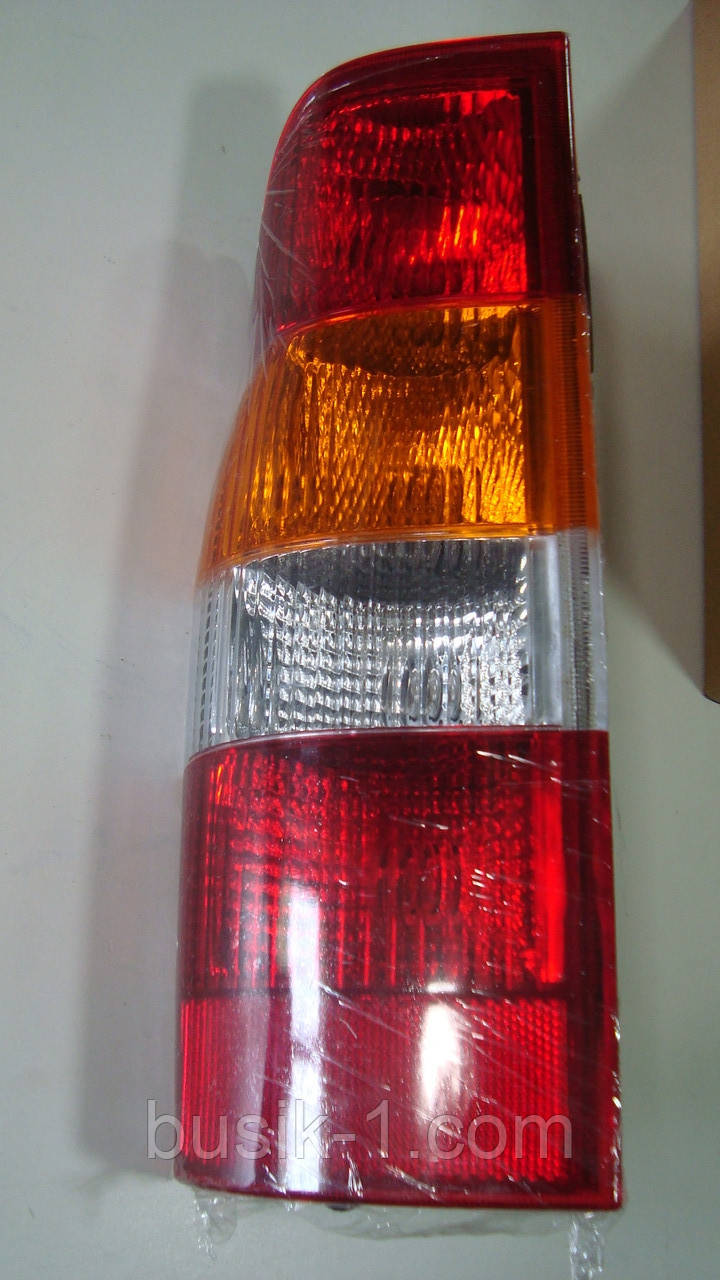 Ліхтар задній + плата ліва Ford Transit 00-06г.в. Жовтий поворот Китай