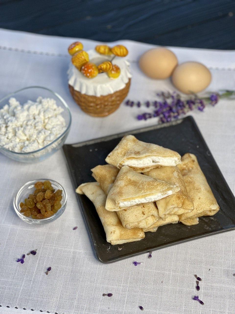Млинці з сиром та родзинками