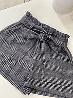Шорти для дівчинки із сірого костюмного трикотажу в клітинку на резинці з кишенями р. 122-158