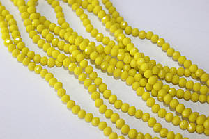 Кришталеві намистини "Рондель" жовті матові, 6х4.4 мм