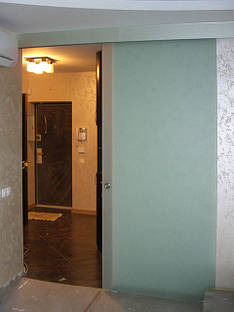 Розсувні скляні двері