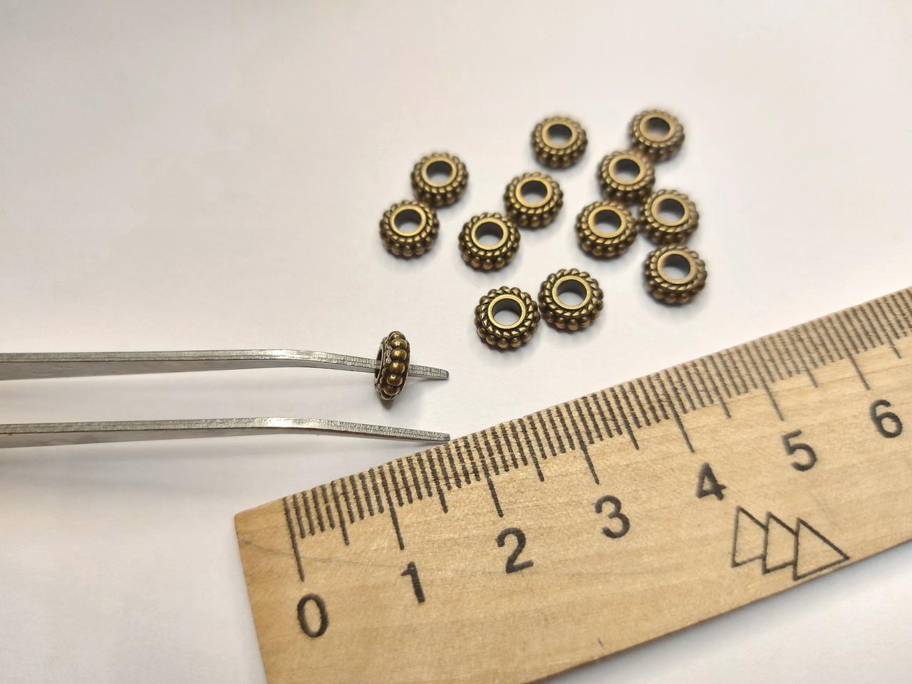 Фурнітура для біжутерії намистина металева "Колесико" Діаметр 7мм Колір ант броза. Ціна за 10шт