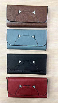 Гаманець жіночий на кнопці зі штучної шкіри у різних кольорах Kabir