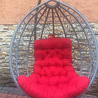 Крісло-кокон із ротанга, сірий із червоною подушкою