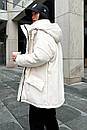 Чорна зимова жіноча куртка з екошкіри з поясом та капюшоном оверсайз, фото 7