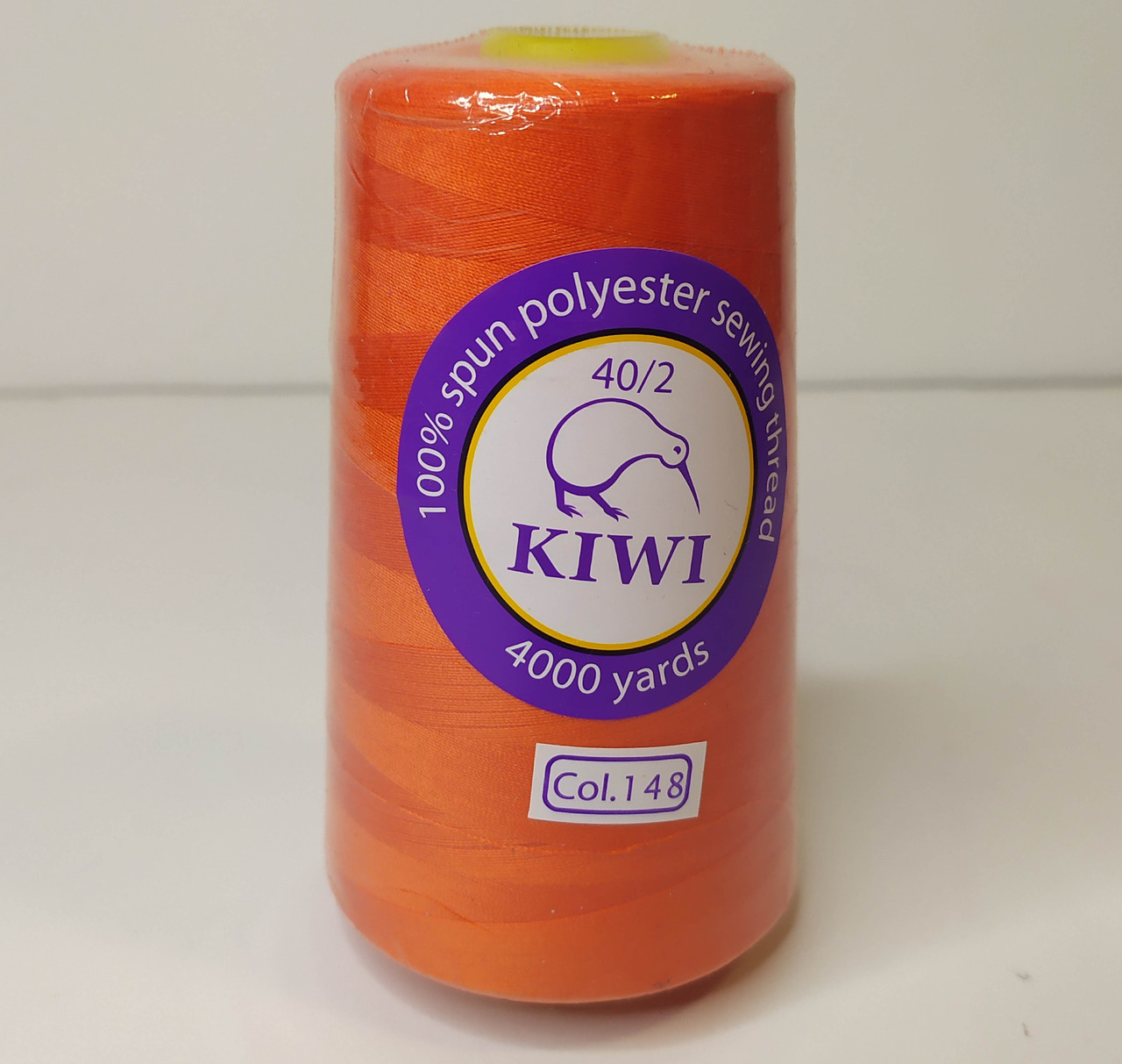 Нитки помаранчеві KIWI col.148 швейні N40 великі бобіни 4000 ярдів оранжевого кольору для машинного шиття