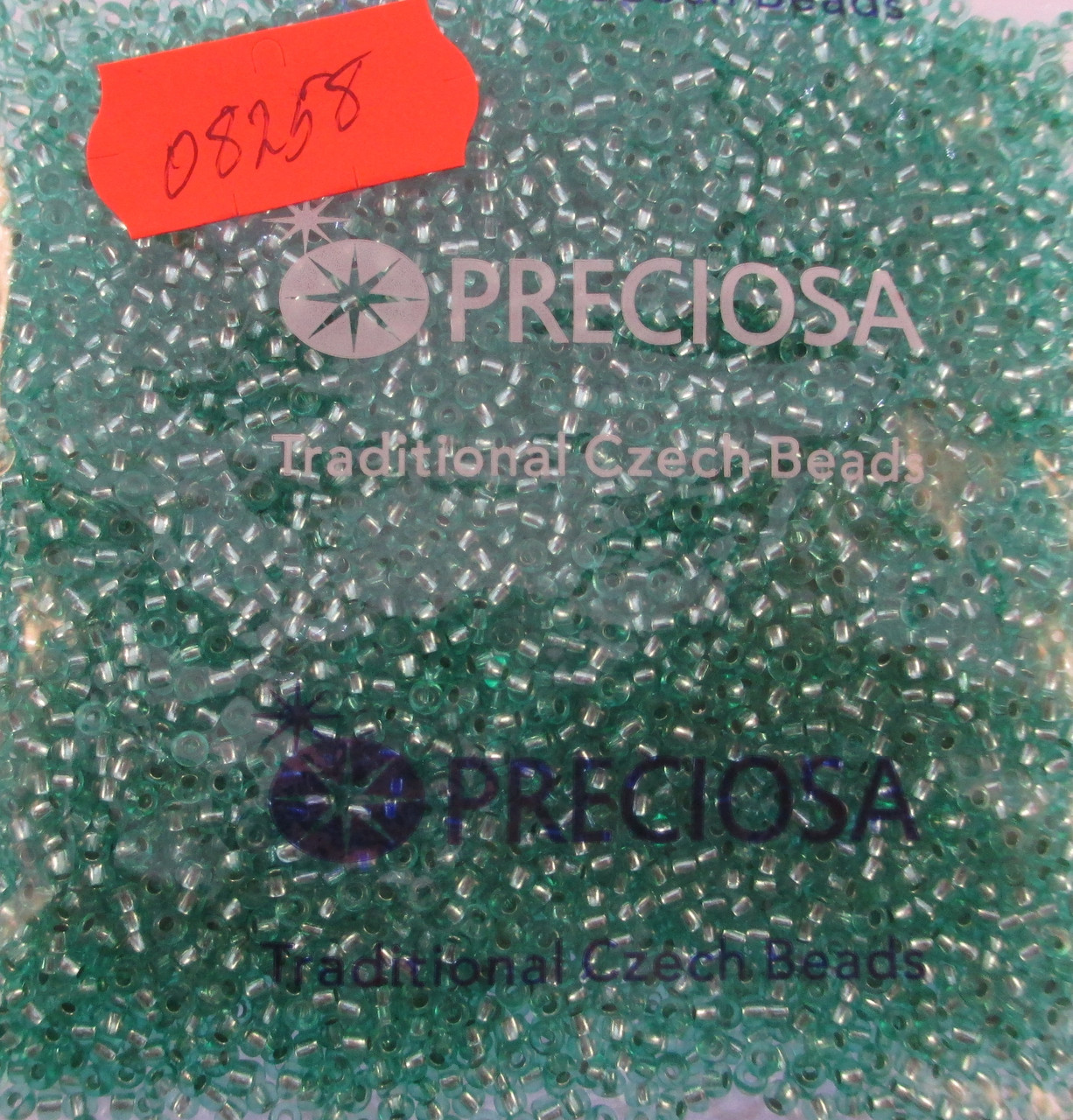 Бісер 10/0, колір — яскравий бірюзовий, No08258 срібна серединка (пач.50 грамів)