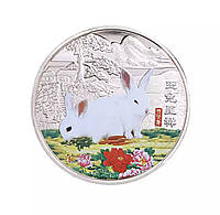 Серебряная монета два белых кролика для любви гармонии и больших денег