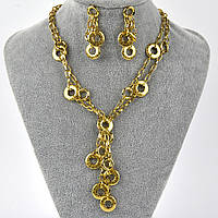 Комплект кольє та сережки золотистого кольору двошарове з візерунками сережки гвоздики 4,5 см довжина кольє 47 см