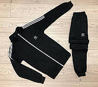 Утепленный мужской спортивный костюм Adidas черного цвета. Черный зимний мужской спортивный костюм Adidas