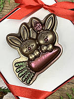 Шоколадні зайчики. Шоколадні новорічні подарунки. Шоколадний символ 2023. Шоколадна пара кроликів.