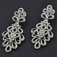 Сережки гвоздики масивні металеві сріблясті з білими кристалами довжина 7 см ширина 31 мм