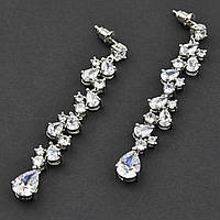 Сережки гвоздики металеві сріблясті з білими кристалами Зварювання крапельки довжина 6,5 см ширина 10 мм