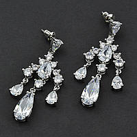 Сережки гвоздики металеві сріблясті люстри з переливними стразами Сваровська довжина 5 см ширина 18 мм