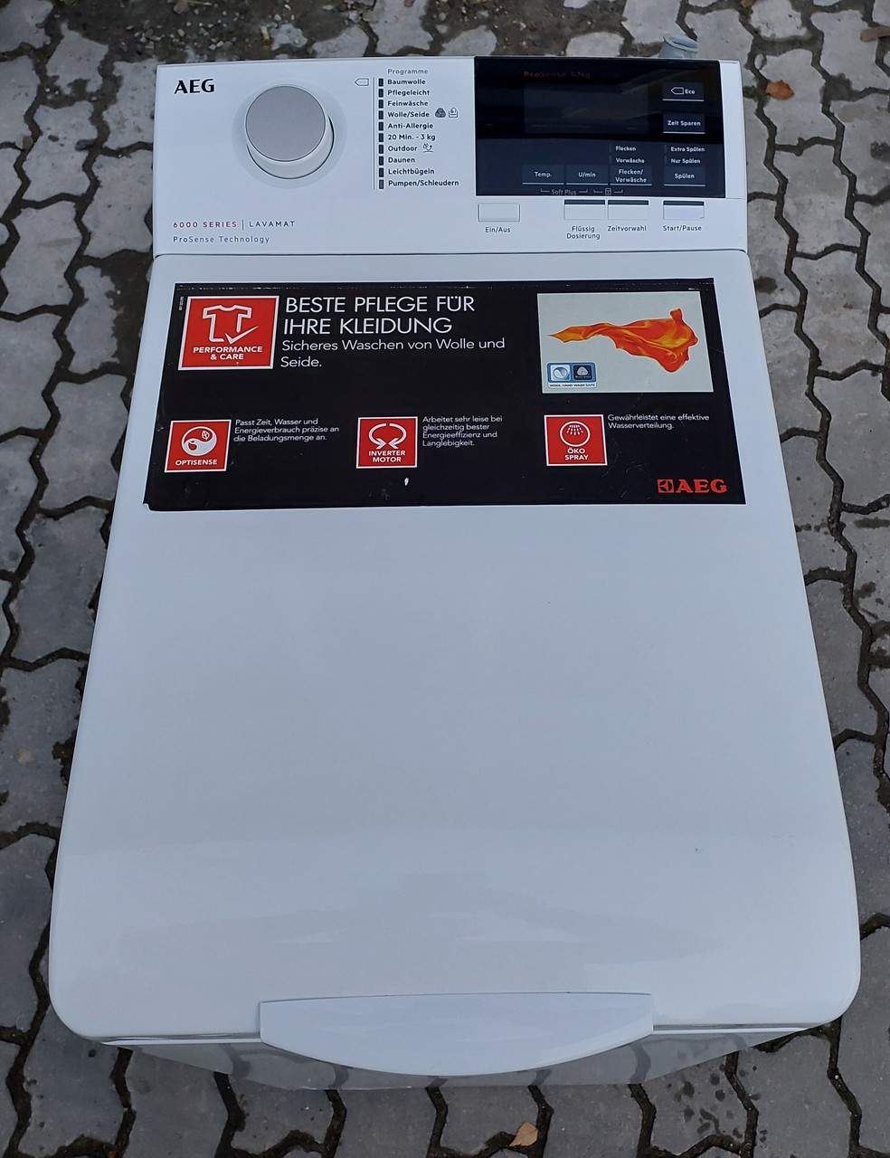 Вертикальна пральна машина Аег AEG lavamat 6000 Series ProSense 7 KG