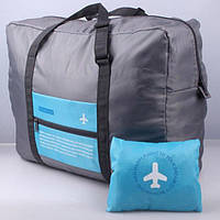 Вместительная дорожная сумка для ручной клади или багажа, складывается в мешочек (с синей вставкой)