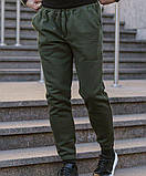 Чоловічі теплі спортивні штани на махрі кольору хаккі, фото 2