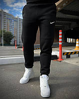 Теплые спортивные штаны мужские Nike черные трехнитка с начесом , Зимние спортивные штаны Найк wear