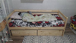 Підліткове дерев'яне ліжко з шухлядами