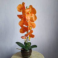 Искусственная латексная орхидея VIP в коричневом керамическом кашпо на одну ветку оранжевая (ОКГ12003803)
