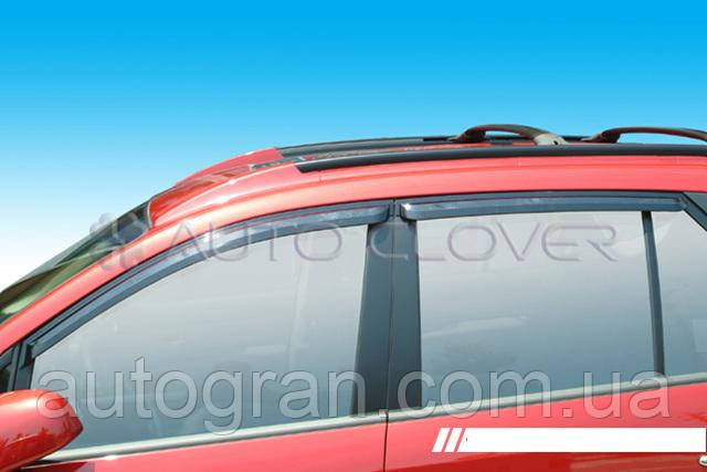 Дефлектори вікон вітровики Kia Carens 2006-