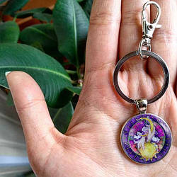 Брелок сонце та місяць бузковий