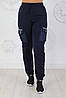 Жіночі теплі штани з трикотажу тринитка з накладними кишенями Карго з плащової тканини, фото 4