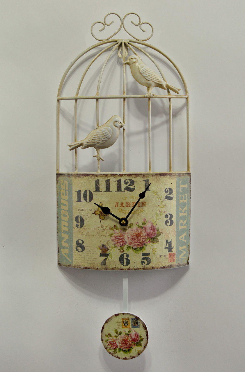 Настінний кварцовий годинник з маятником "Пташина клітка" розміром 40 x 21 x 5,5 см.