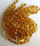 Бусина Овал кручений колір бурштиновий 10*13 мм, фото 2