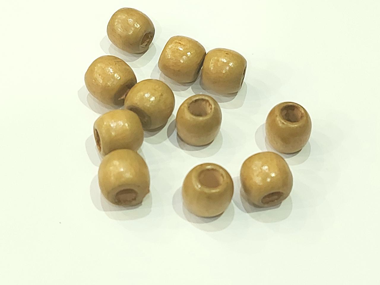 Намистини  дерев'яні 12\11 мм  Бежеві лаковані 10 шт/уп..