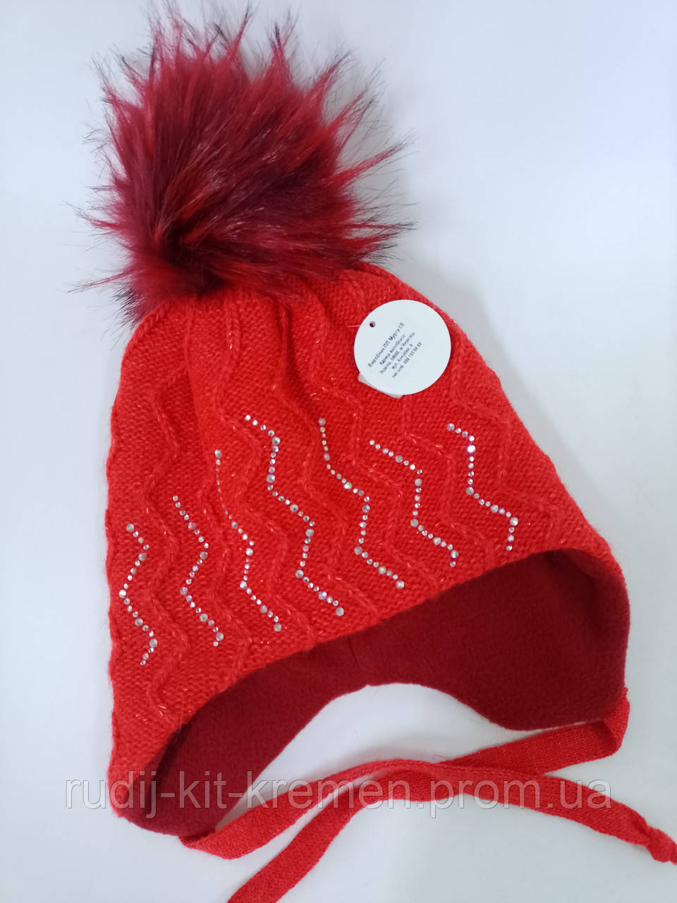 Зимова шапка для дівчинки на зав'язках із бубоном