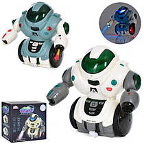 Робот UKA-A0234 (18шт) 17см,зв(укр),їздить,танцює,пар,світло,стріляє пул,2кол,бат,у кор-ці, 18-17-10см