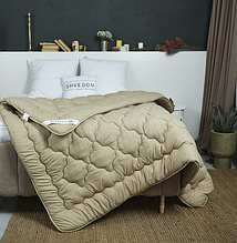 Домашній текстиль: ковдри, подушки, ватні матраци