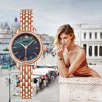 Зовнішній жіночий годинник із золотистим браслетом код 677 продаж