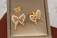 Серьги гвоздики Xuping Jewelry жемчужные бантики 1.8 см золотистые