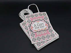 Екопакети паперові крафтові з візерунком. Колір рожевий. 15х8х21см / Екопакети паперові крафтові з візерунком. Колір рожевий.