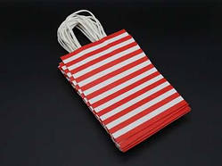 Крафт-пакети з крученими ручками в смужку. Колір червоний. 15х8х21см / Крафт-пакети з крученими ручками в смужку. Колір червоний.