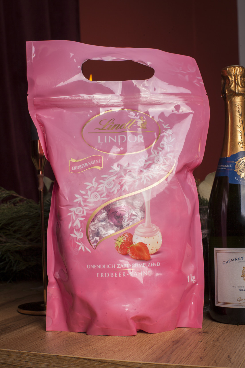 Цукерки🍬Lindt Lindor "Erdbeer Sahne" 1 кг. Швейцарія., фото 1