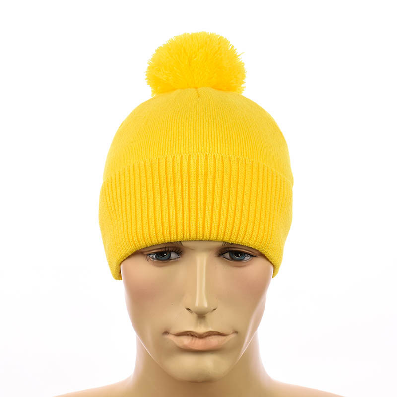 Молодіжна шапка с помпоном жовтий