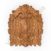 Різьблений картуш - декоративна накладка з дерева на меблі або двері.