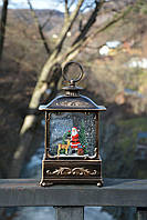 Новогодний музыкальный фонарь ночник с подсветкой и снегом Дед Мороз 25см