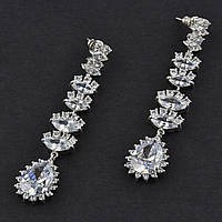 Сережки гвоздики металеві сріблясті з білими кришталевими камінцями довжина 6,5 см ширина 14 мм