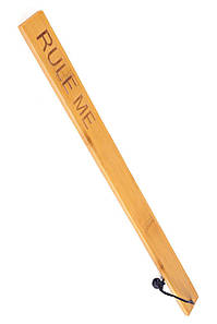 Паддл Fetish Tentation — Paddle Rule Me Bamboo, упакований у ПЕ пакет