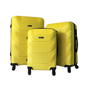 Комплект валіз Флай всі розміри Набір валіз FLY 2019 ABS пластик 4-колеса 3шт L/M/S Жовтий