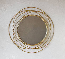 Настінне дзеркало кругле зі скла та металу із золотою рамою   91075