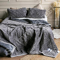 Пледи і покривала