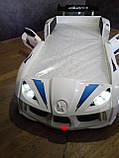 Ліжко машинка Audi біле з підсвіткою, відкривними дверима та звуковими ефектами з пультом, фото 6