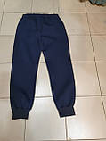 Чоловічі спортивні штани на манжеті синього кольору., фото 2