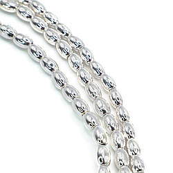 Намистини Рис Гематит 4х6 мм Срібло 40 см +-65 шт.